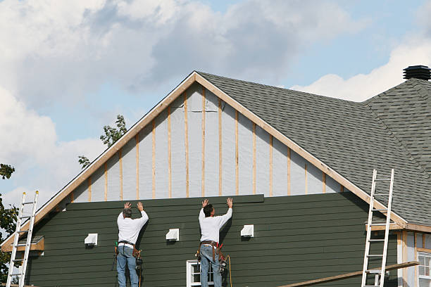 Professional Siding Installation technician working in Gill, CO
